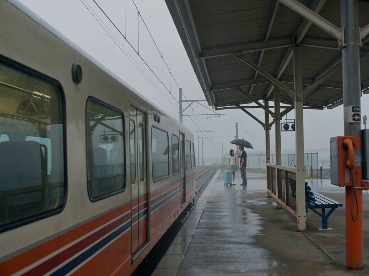 Poster frame: 1990s East Asian rainy station farewell in Higgsfield Seedance 2.0