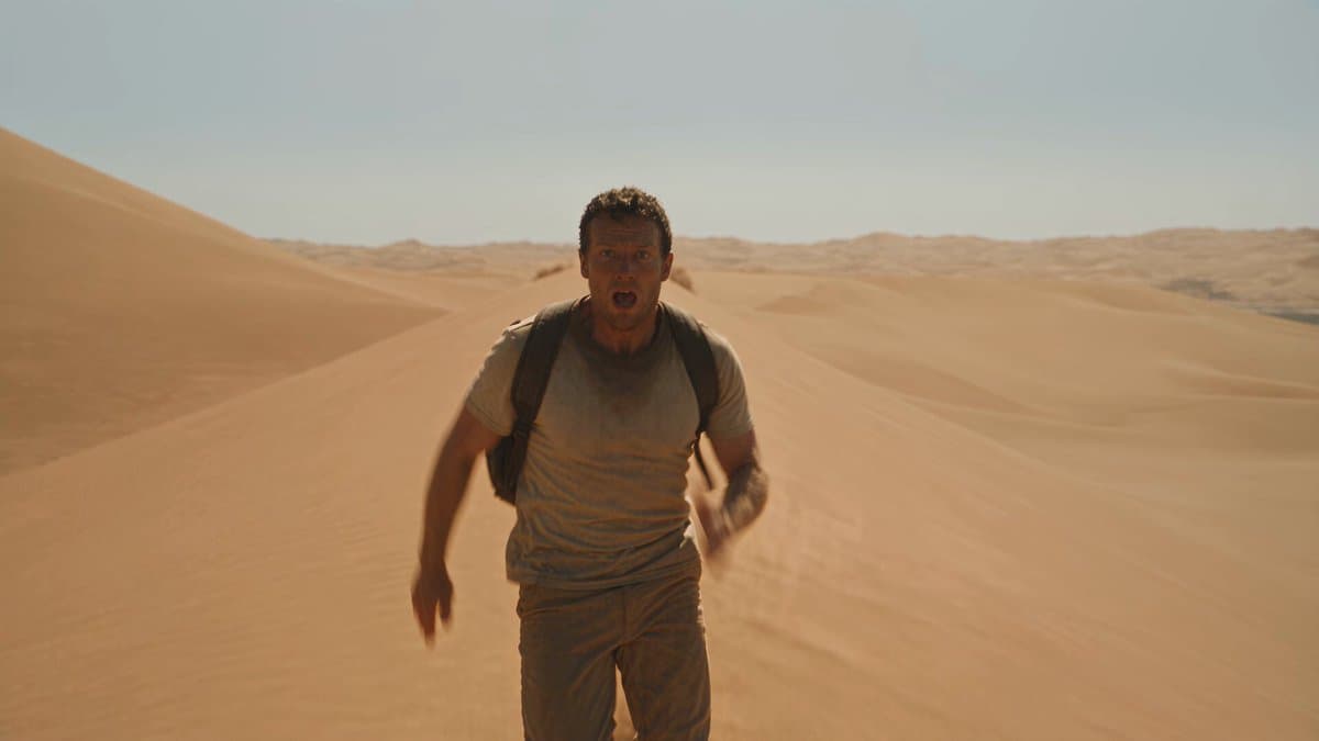 Poster frame: Giant desert serpent chase in one continuous Seedance 2.5 prompt